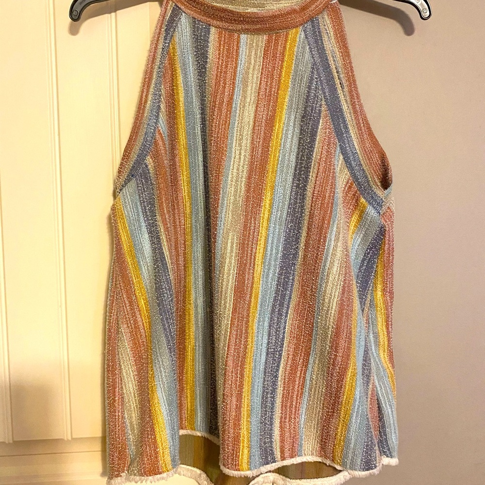 Sleeveless top from W5 with a frayed bottom.